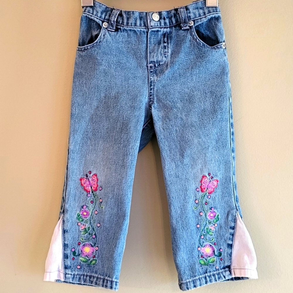 Embroidered light wash flare denim jeans